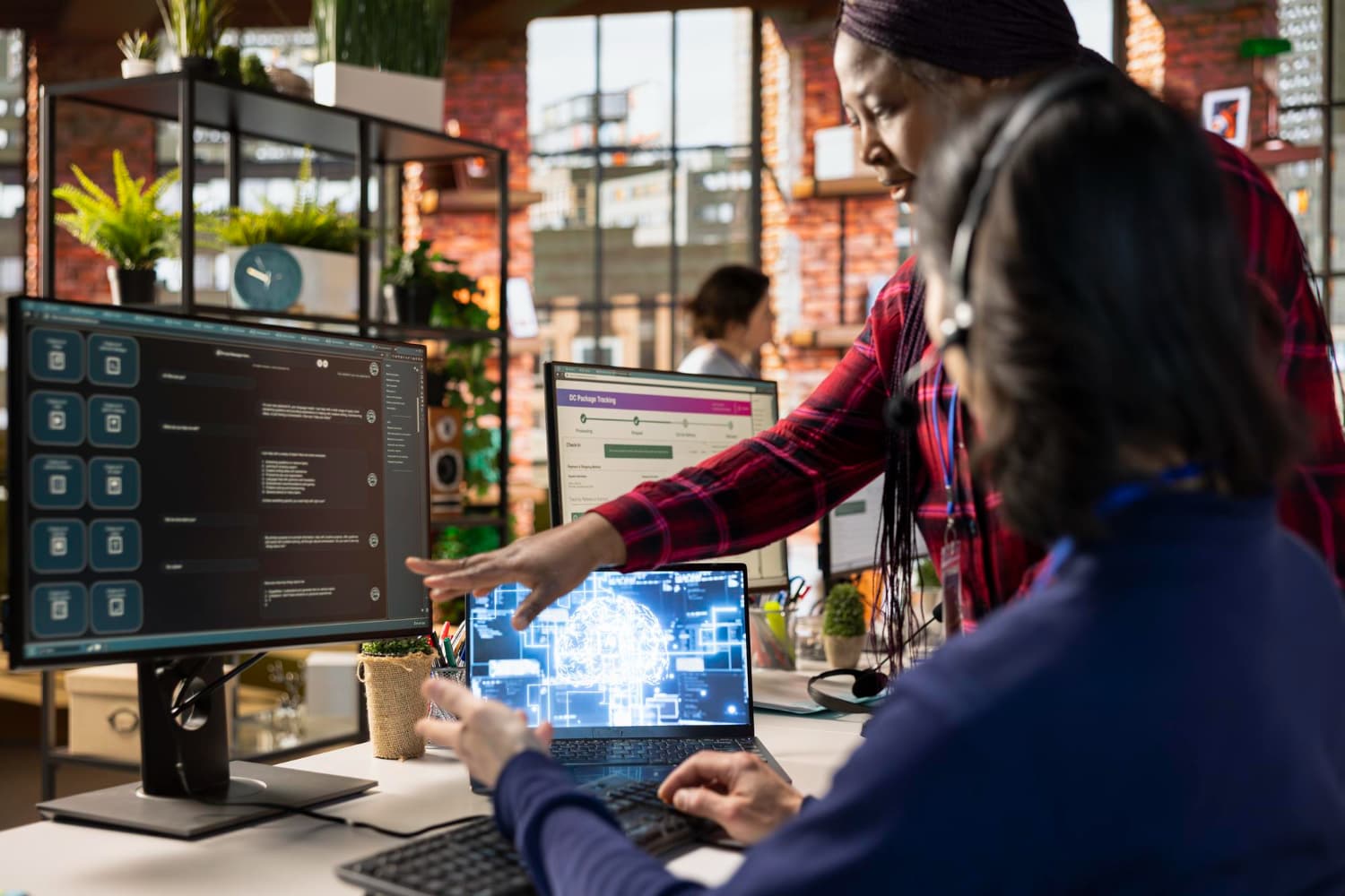 Hand interacting with a holographic display of no-code workflow automation icons