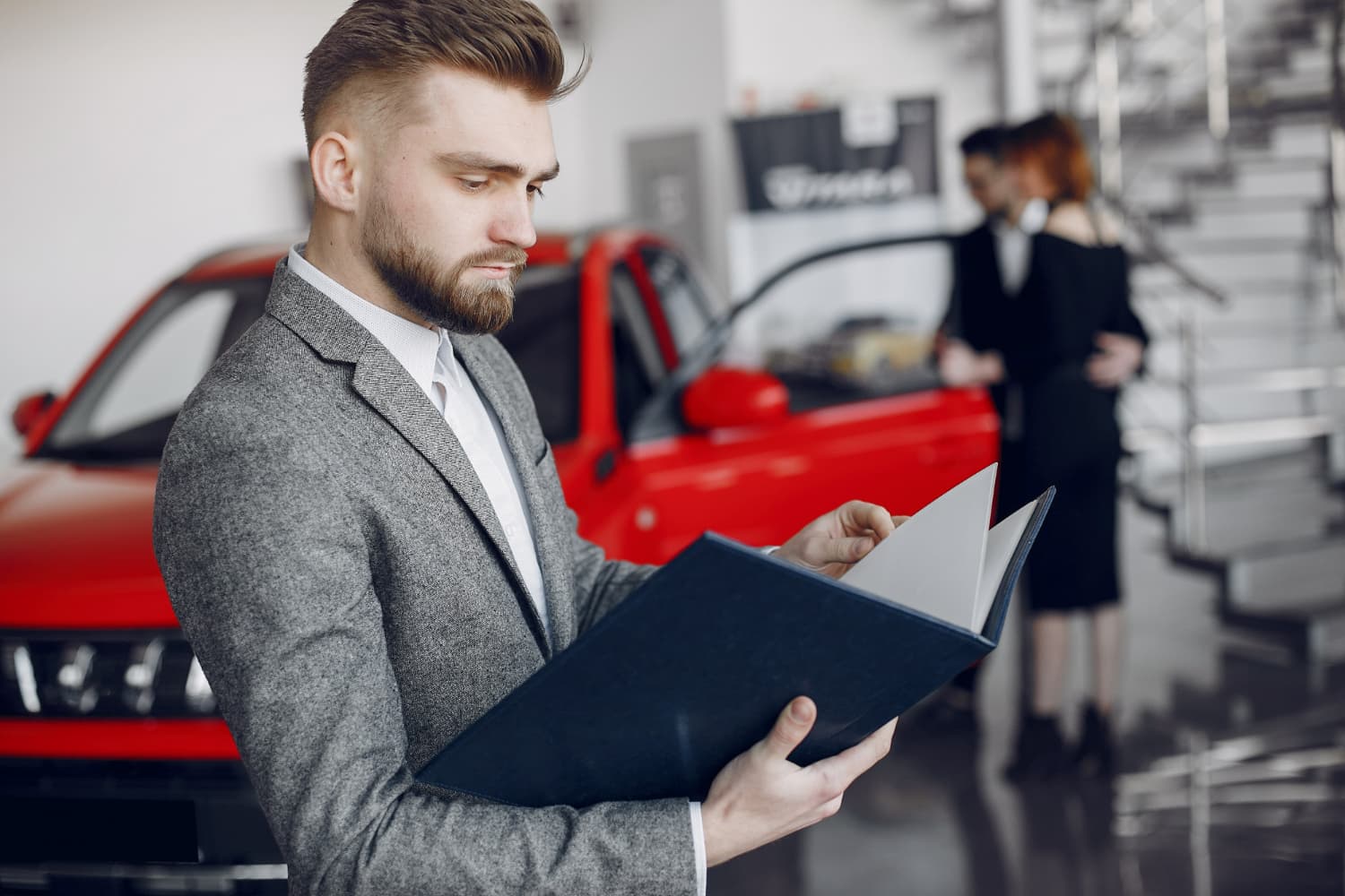 Compliance officer reviewing emissions and safety regulatory requirements